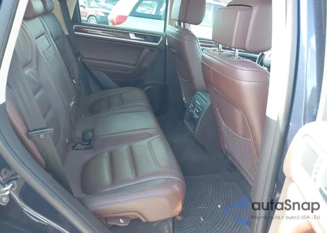 2014 Volkswagen Touareg Tdi Lux z USA, uszkodzony, nr VIN WVGEP9BP2ED014591